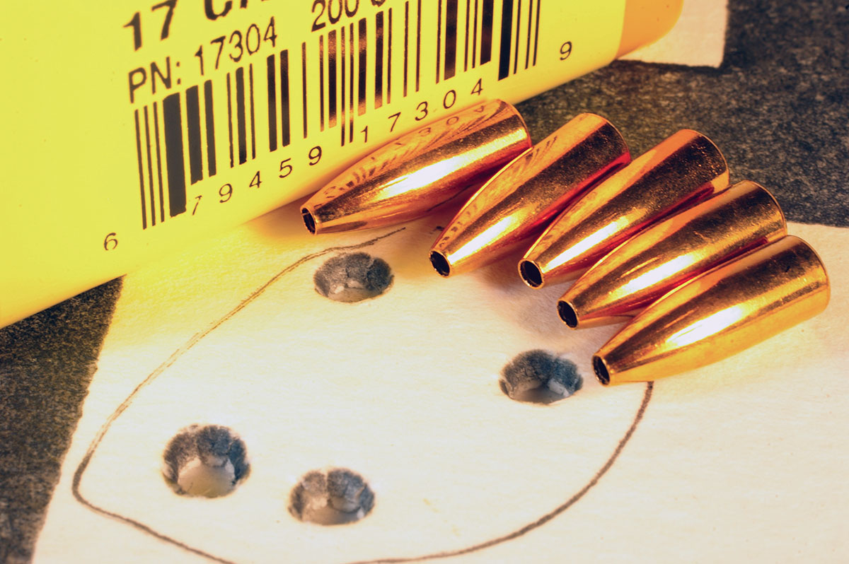 This .65-inch, five-shot group was from John’s handloads with Berger 20-grain Flat Base Target bullets and Reloder 7.